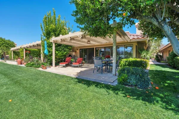 an outdoor space with lots of green space