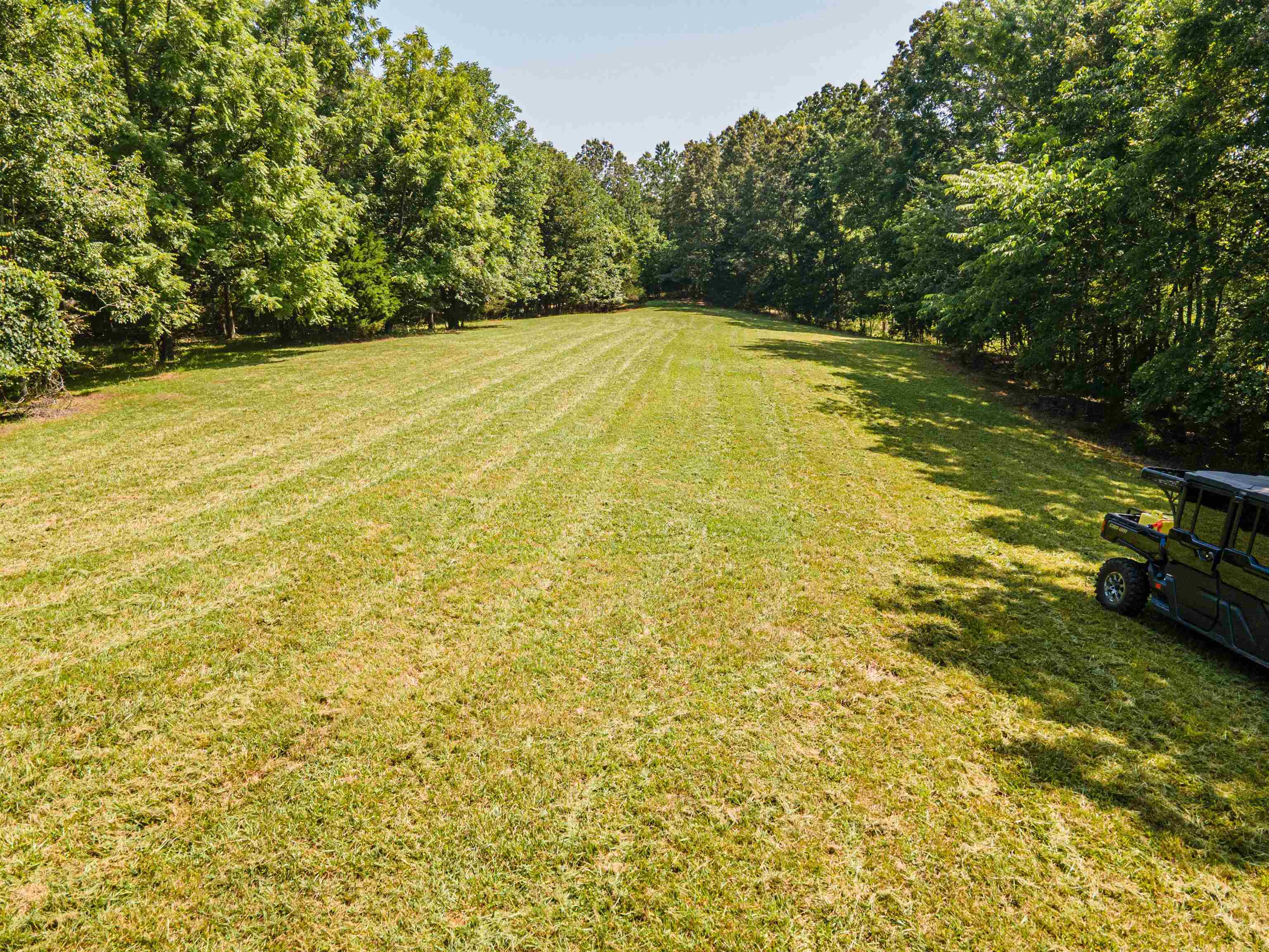 Country Club Road Somerville, TN 38068 - Photo 12 of 22 a view of a swimming pool with an outdoor space and seating area