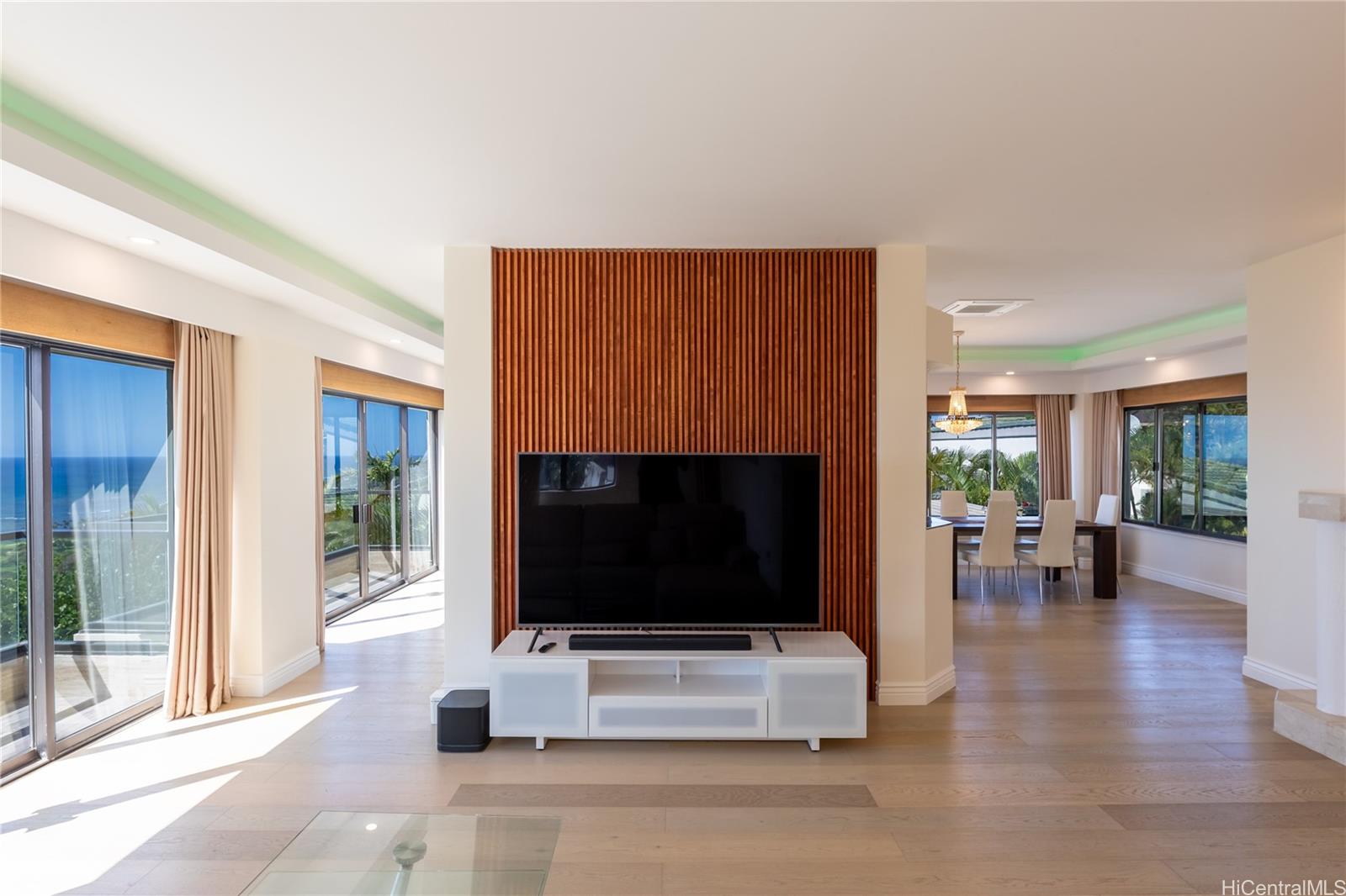1632 Ihiloa Loop Honolulu, HI 96821 - Photo 4 of 24 a living room with furniture flat screen tv and a fireplace