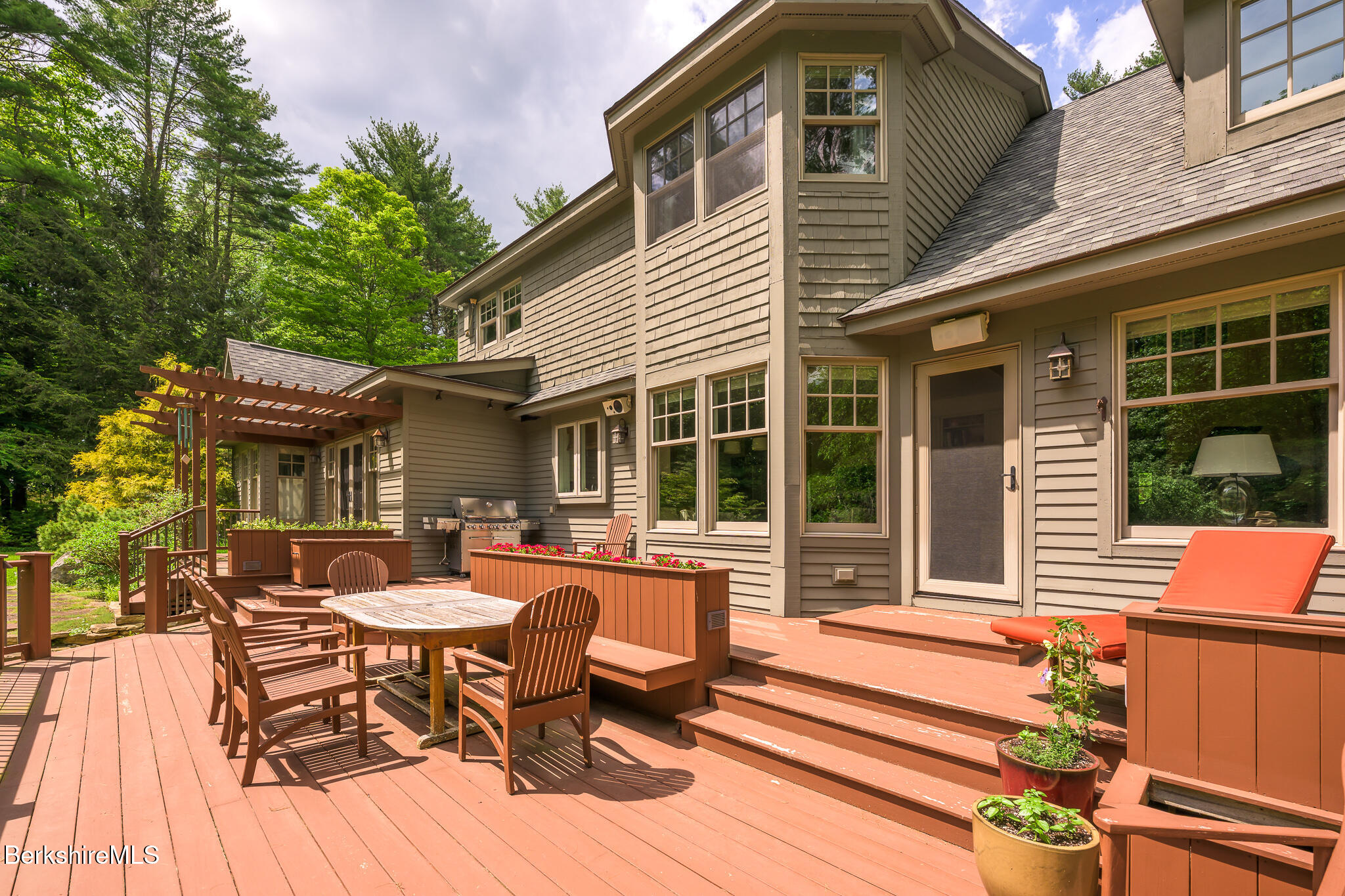 430 Lenox Road Richmond, MA 01254 - Photo 54 of 66 a view of a wooden chairs and table in the patio