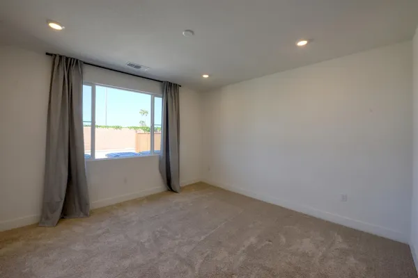 an empty room with an entryway