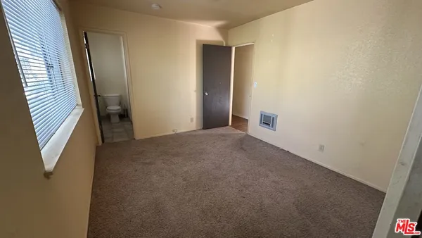 a view of a room with an empty space