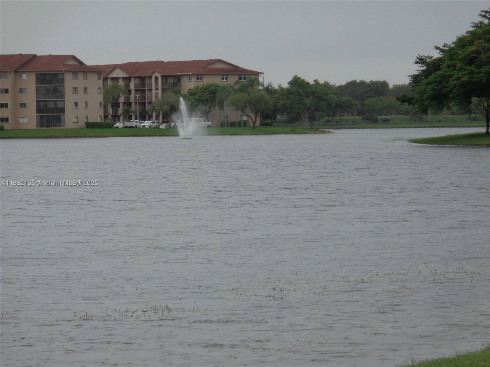 701 Southwest 141st Avenue, Unit 412R Pembroke Pines, FL 33027 - Photo 49 of 52 a view of lake and mountain view
