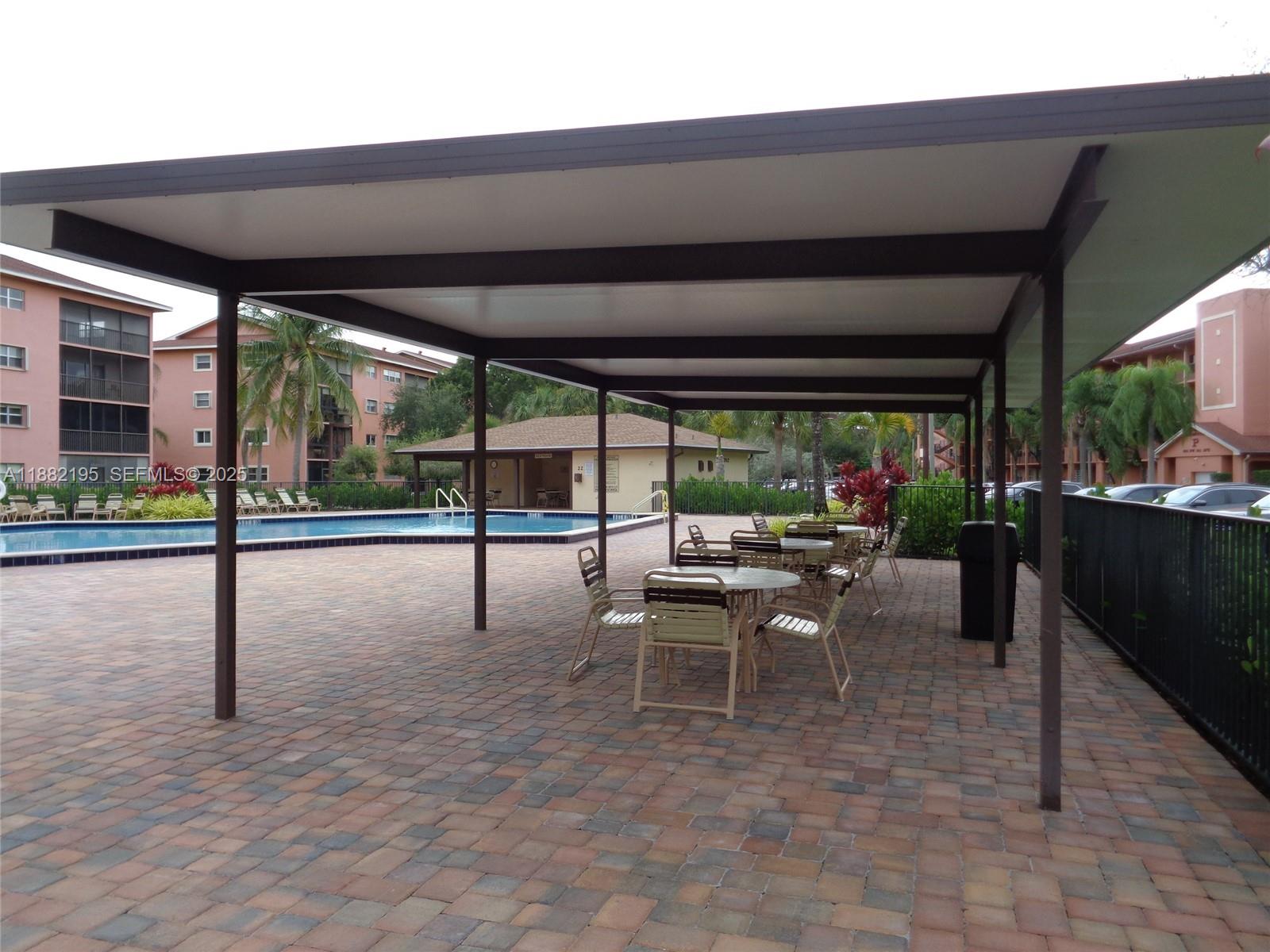 701 Southwest 141st Avenue, Unit 412R Pembroke Pines, FL 33027 - Photo 9 of 52 a view of a patio