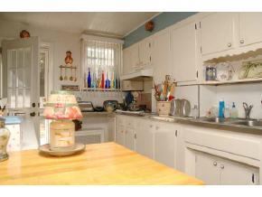 896 Eastern Parkway Brooklyn, NY 11213 - Photo 3 of 8 a kitchen with sink and cabinets