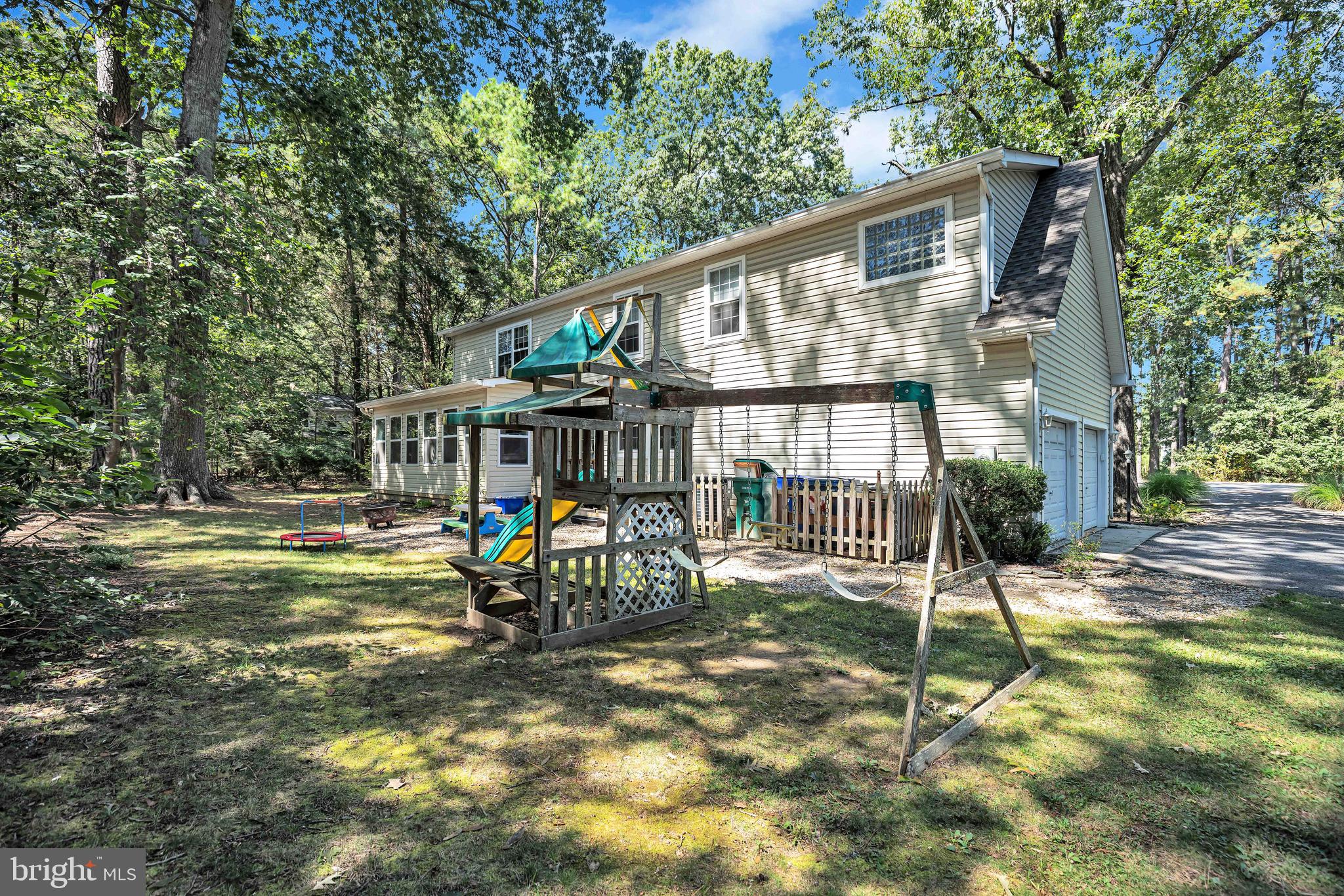11535 Honeysuckle Court Issue, MD 20645 - Photo 17 of 21 a view of a house with backyard and sitting area