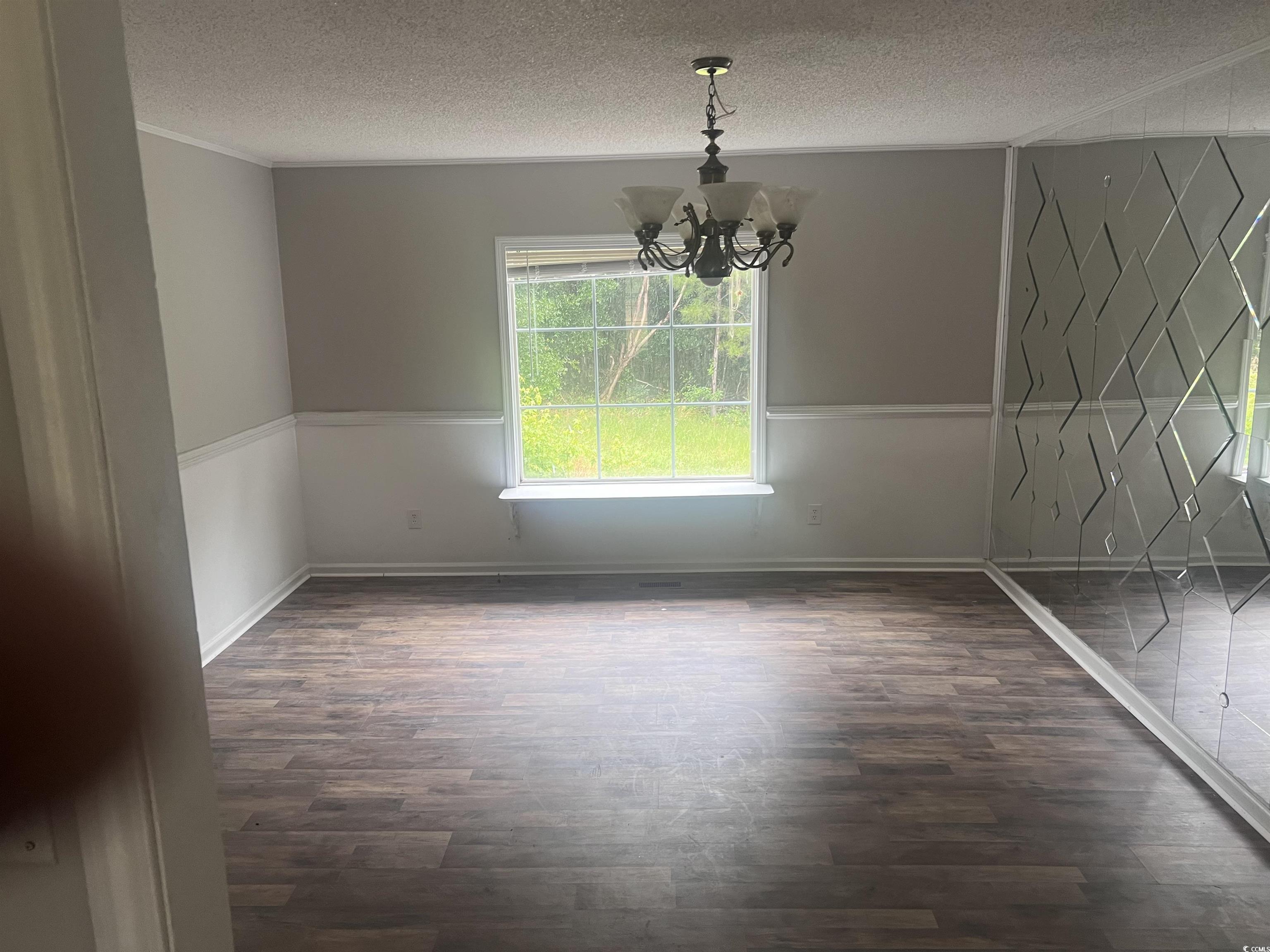 4675 Brailsford Circle Rembert, SC 29128 - Photo 12 of 20 Unfurnished bedroom featuring dark wood-type floor