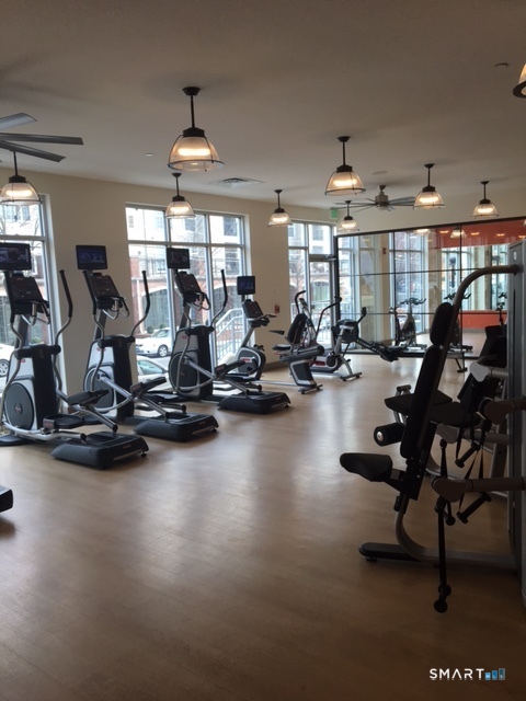 111 Morgan Street, Unit TH5 Stamford, CT 06905 - Photo 20 of 23 a view of a room with gym equipment