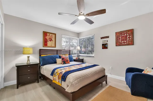 a bathroom with a shower and toilet