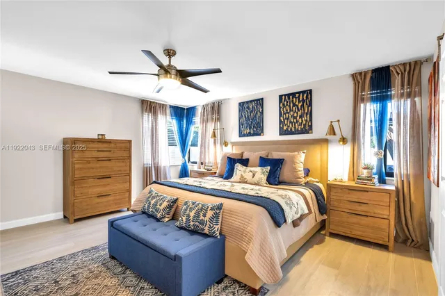 a bedroom with a bed and furniture