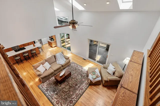 a front view of a house with a yard table and chairs