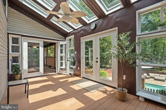a front view of a house with a yard and porch