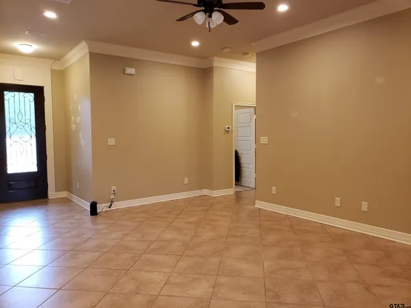 en view of an empty room with a window