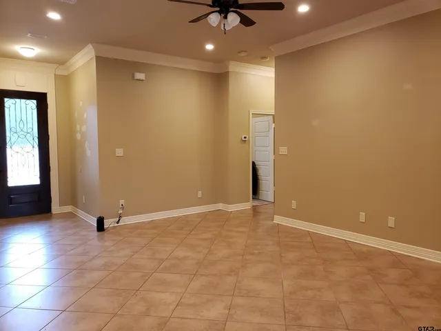 en view of an empty room with a window