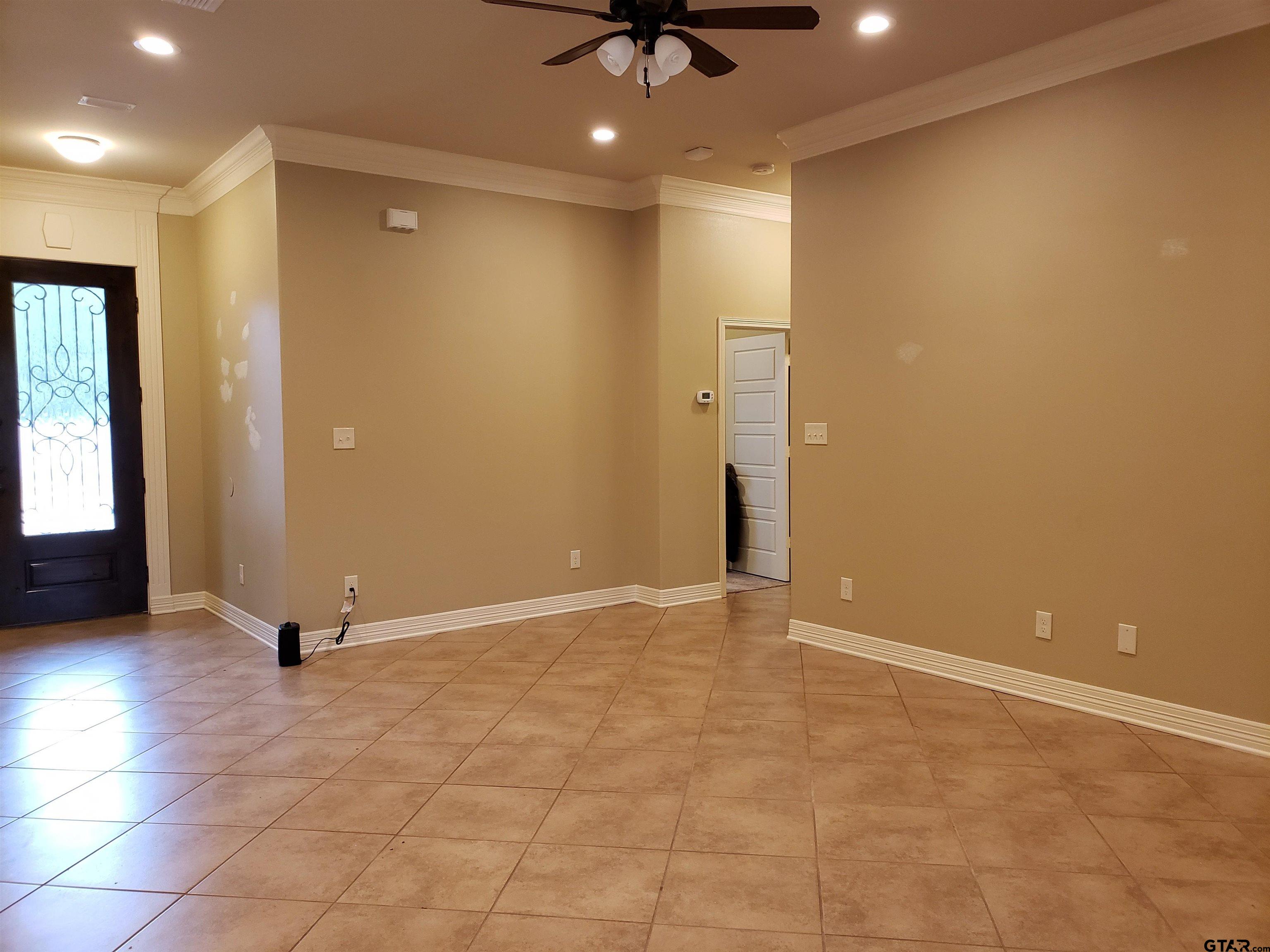 3700 Old Omen Road Tyler, TX 75707 - Photo 2 of 21 en view of an empty room with a window