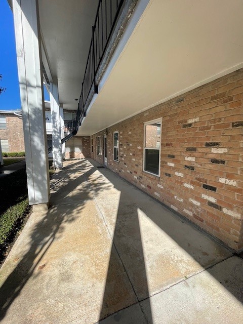 3535 NASA Road 1, Unit 49 Seabrook, TX 77586 - Photo 16 of 17 a view of a pathway both side of house