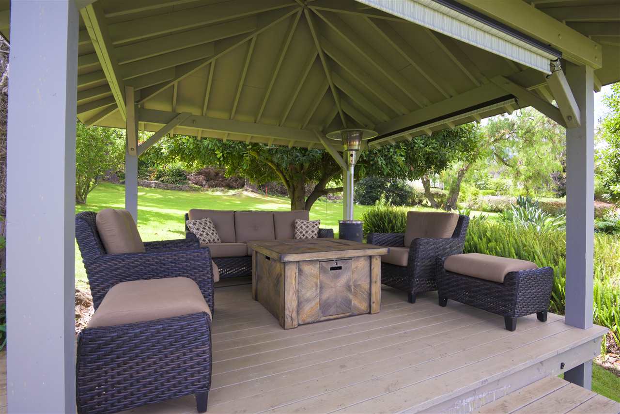 100 Ihe Place Kula, HI 96790 - Photo 4 of 18 a view of backyard with outdoor seating and green space