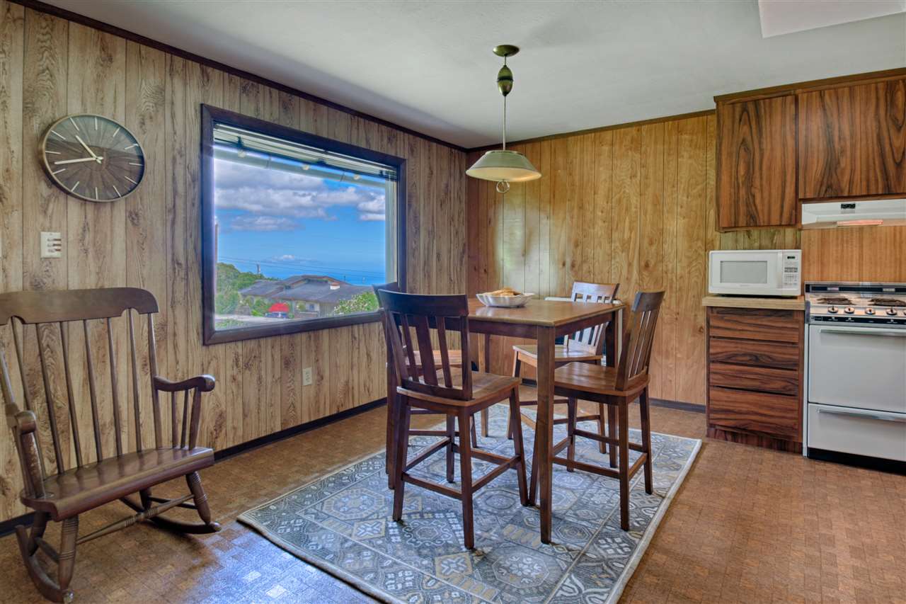 100 Ihe Place Kula, HI 96790 - Photo 8 of 18 a view of a dining room with furniture window and wooden floor