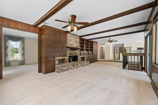 a view of a porch with wooden floor