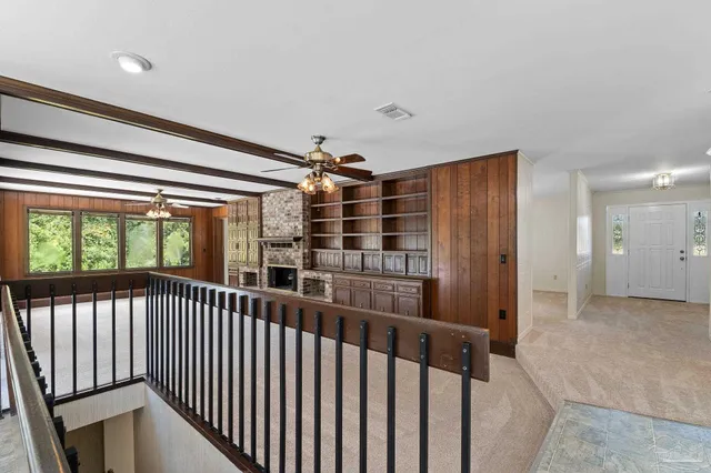a kitchen with stainless steel appliances a refrigerator sink and stove