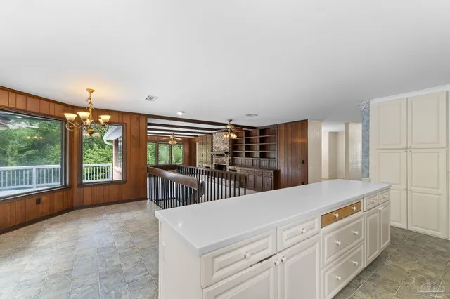 a bathroom with a toilet and shower