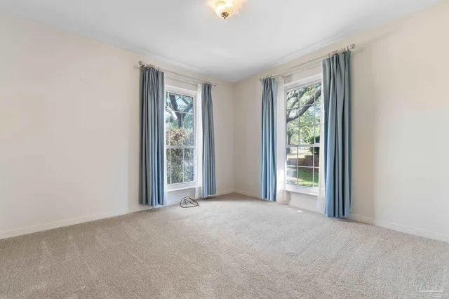 a bathroom with a shower and a sink