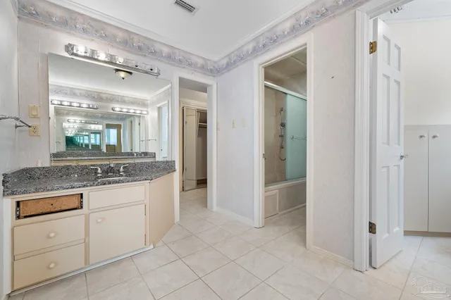 a view of balcony with wooden floor and fence