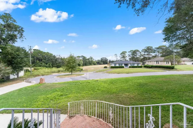 a view of a garden and basketball court