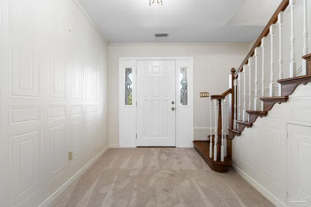 a view of hallway with stairs