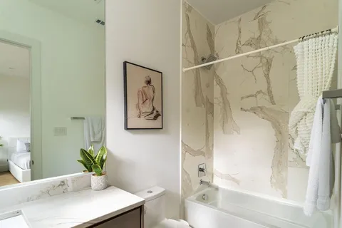 a bathroom with a sink and a bathtub