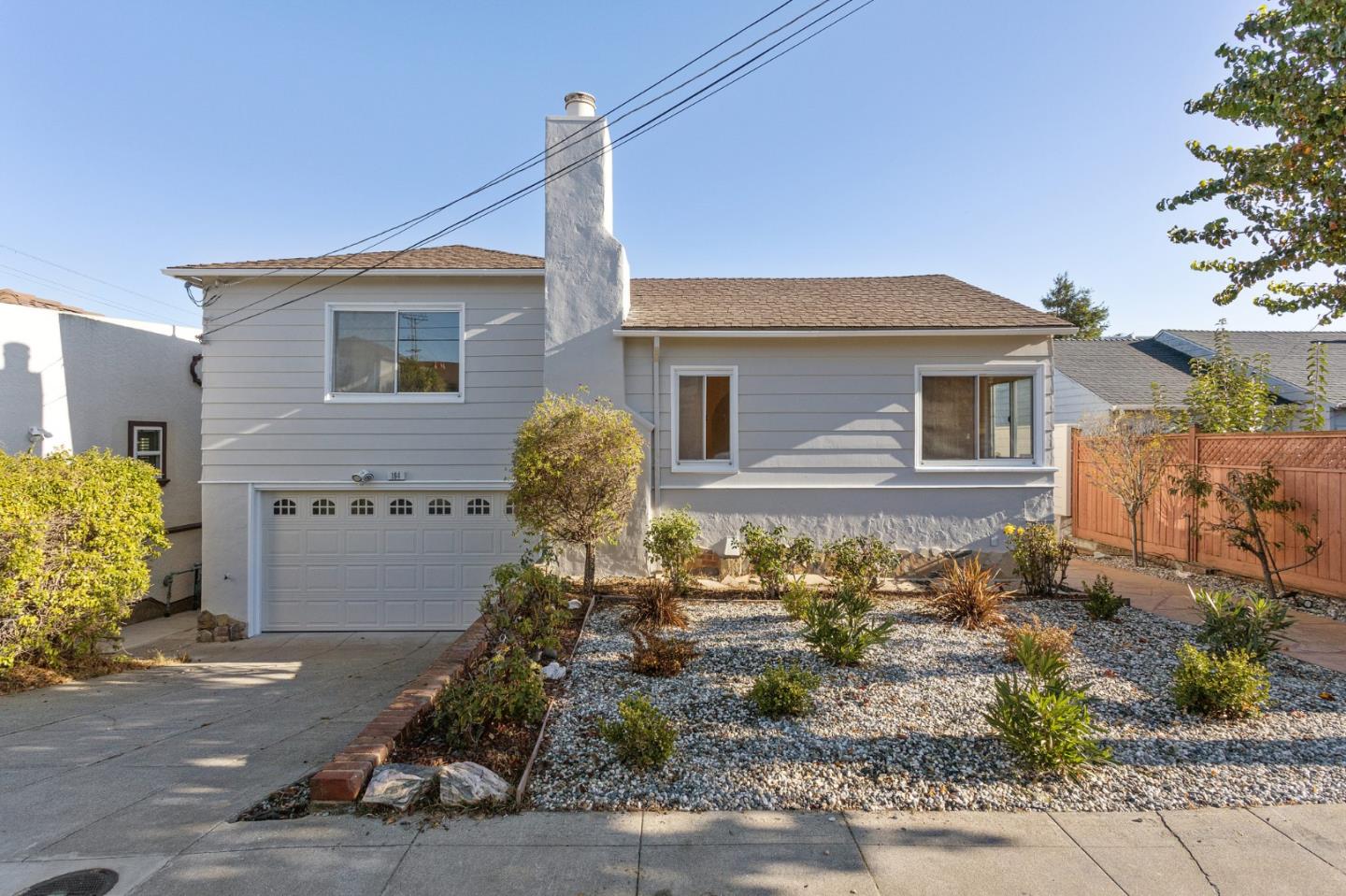 194 Willow Avenue Millbrae, CA 94030 - Photo 2 of 76 a front view of a house with garden