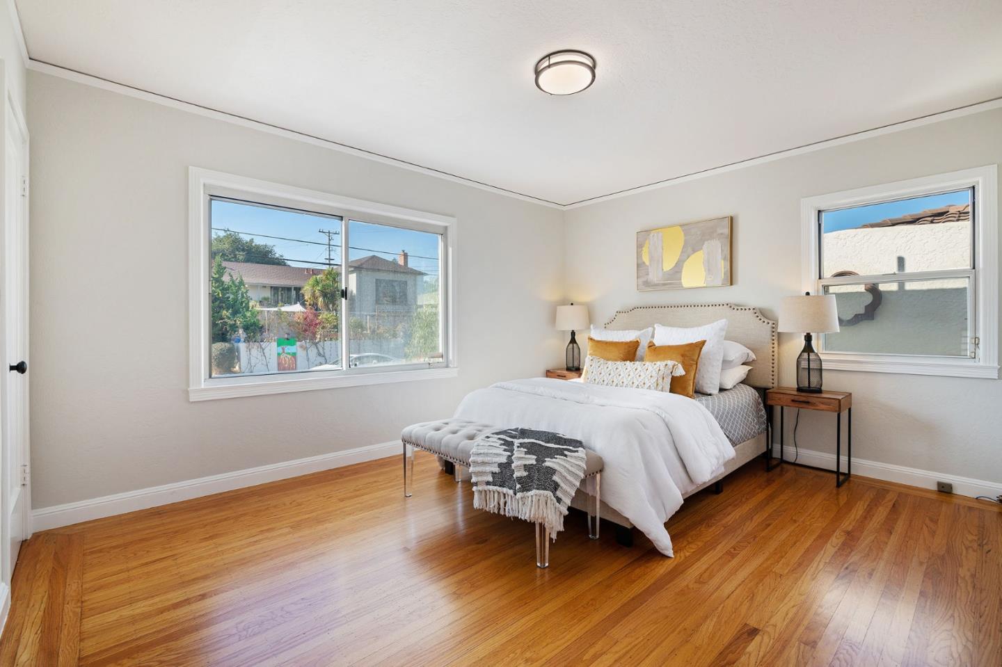 194 Willow Avenue Millbrae, CA 94030 - Photo 26 of 76 a bedroom with a bed and a table in it