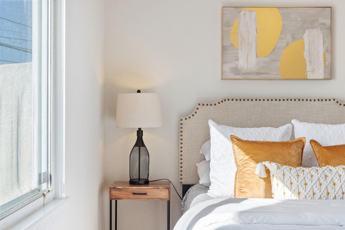 194 Willow Avenue Millbrae, CA 94030 - Photo 27 of 76 a view of a bedroom with a bed and a window