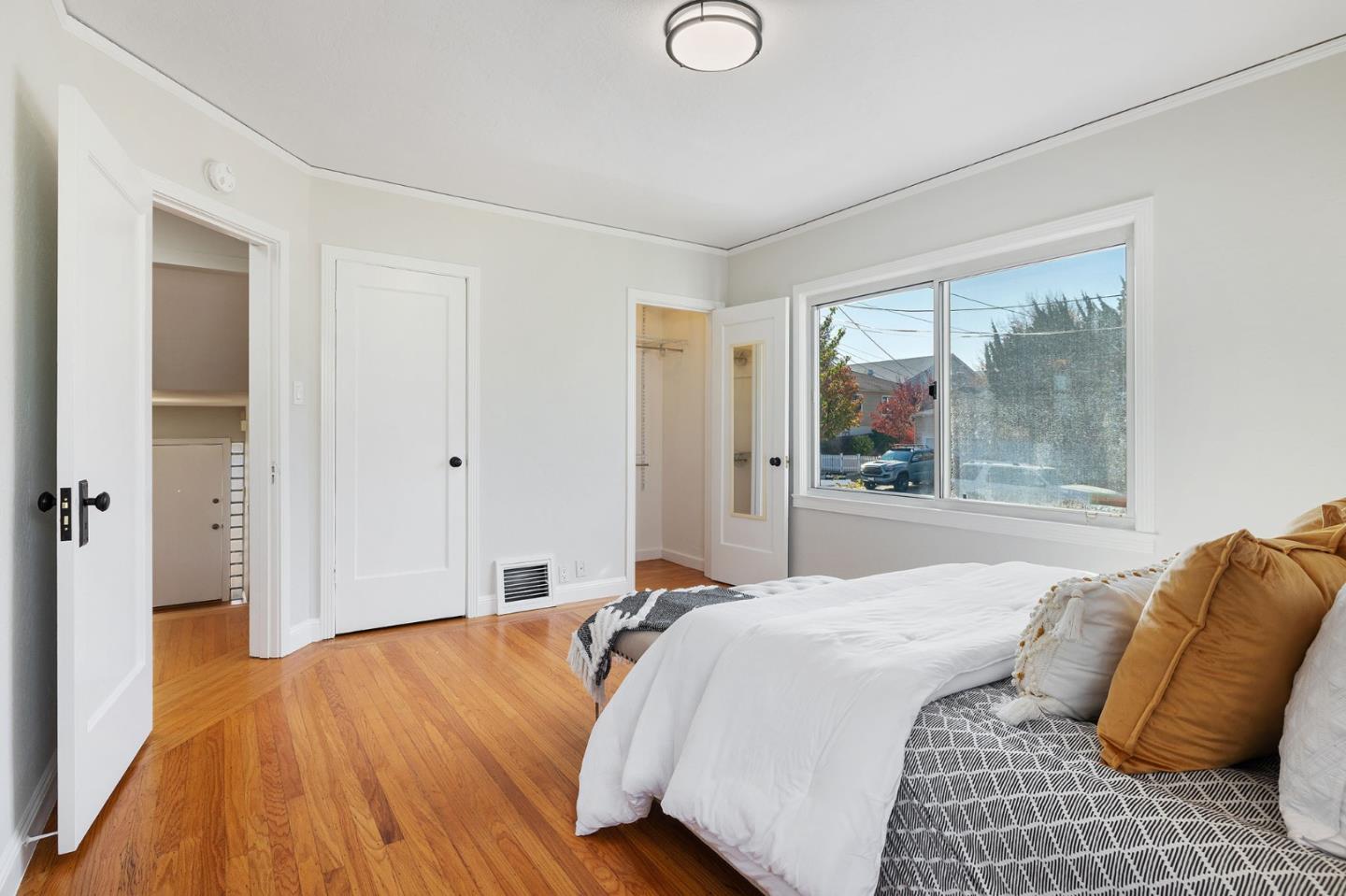 194 Willow Avenue Millbrae, CA 94030 - Photo 28 of 76 a bedroom with a bed and a large window