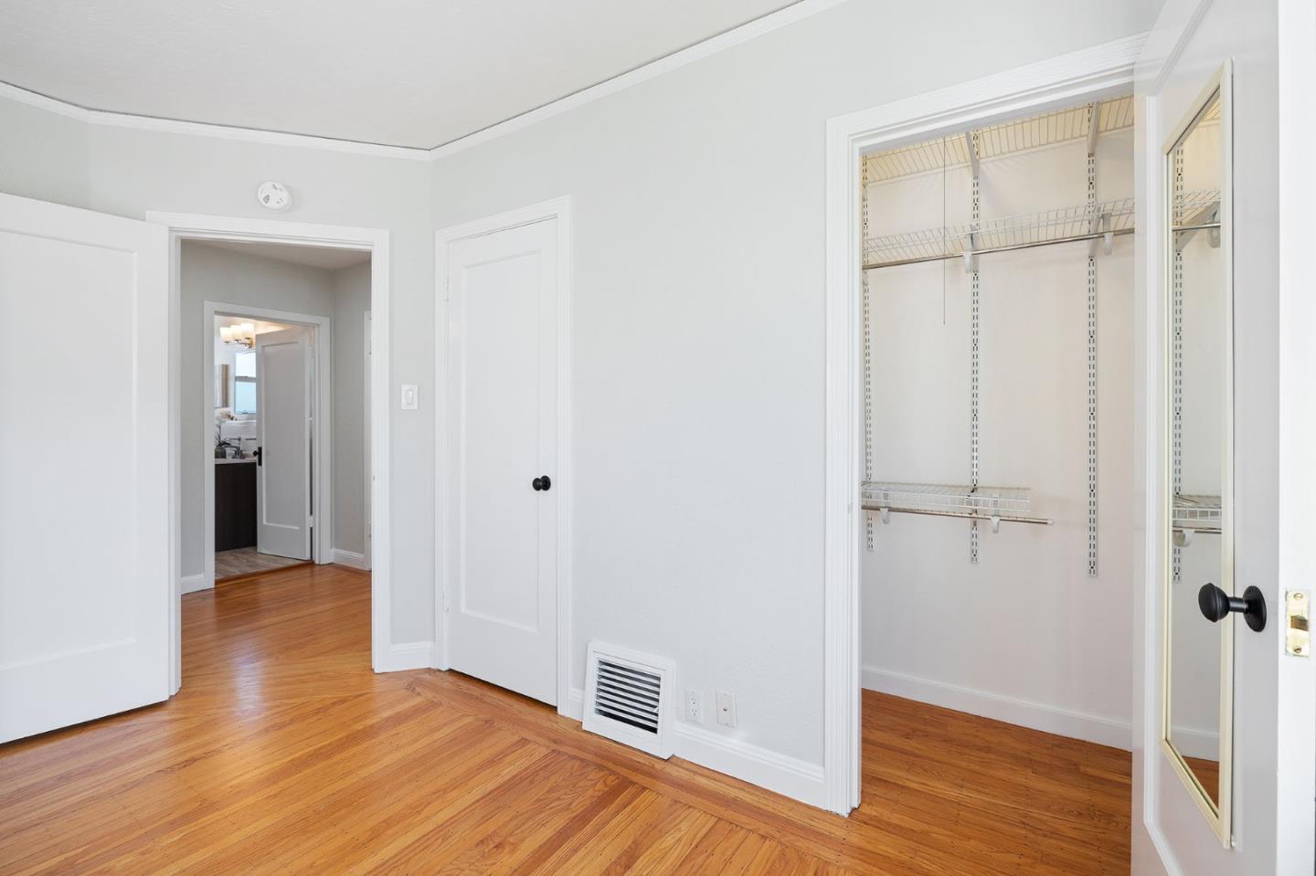 194 Willow Avenue Millbrae, CA 94030 - Photo 29 of 76 a view of empty room with wooden floor