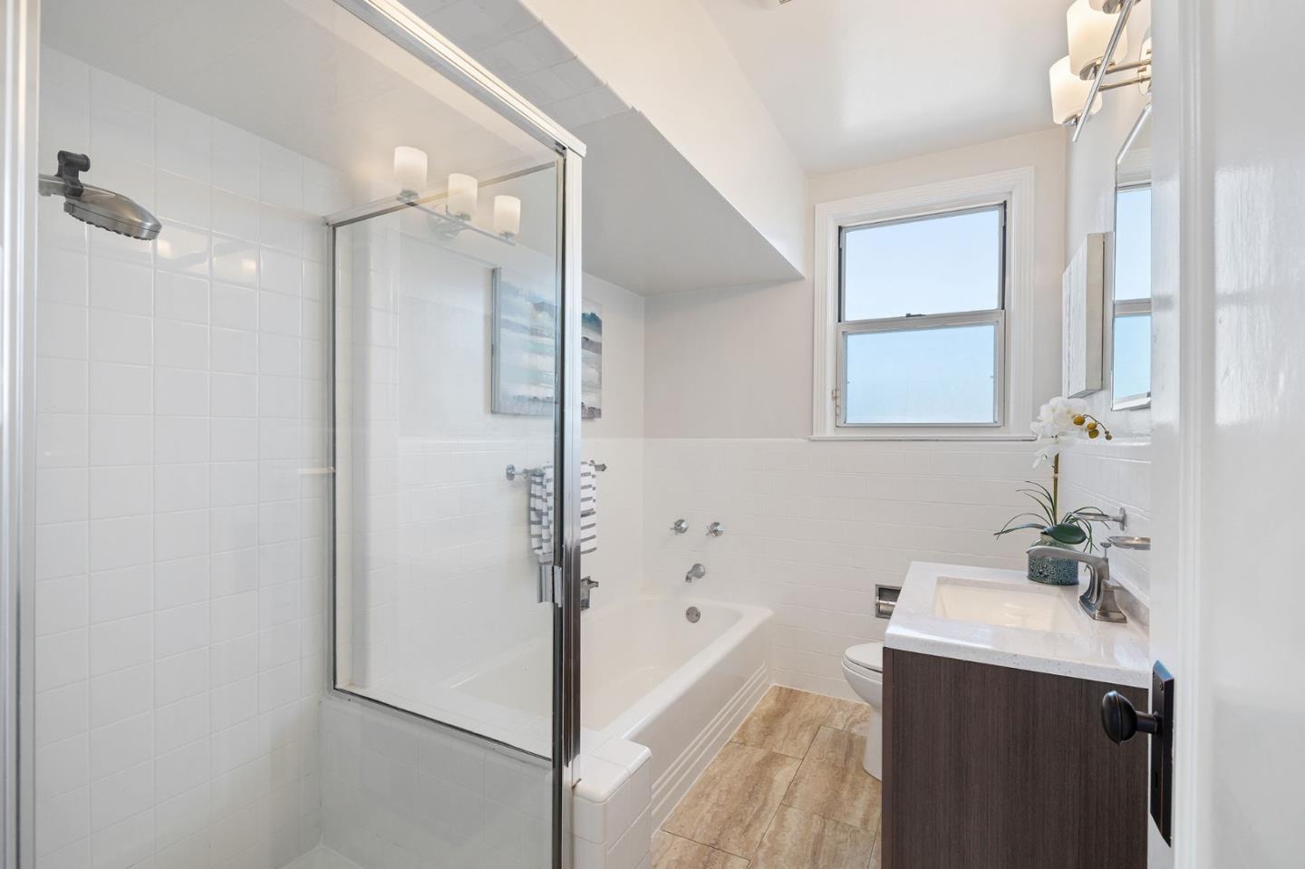 194 Willow Avenue Millbrae, CA 94030 - Photo 30 of 76 a bathroom with a sink and a mirror