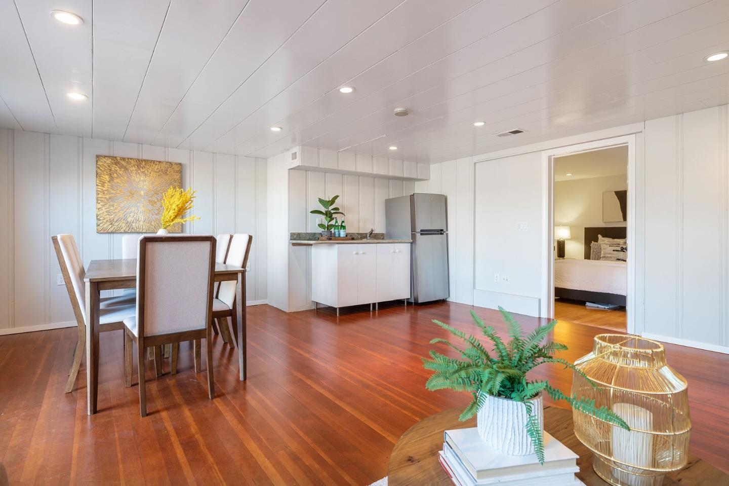 194 Willow Avenue Millbrae, CA 94030 - Photo 41 of 76 a view of a dining room with furniture and wooden floor