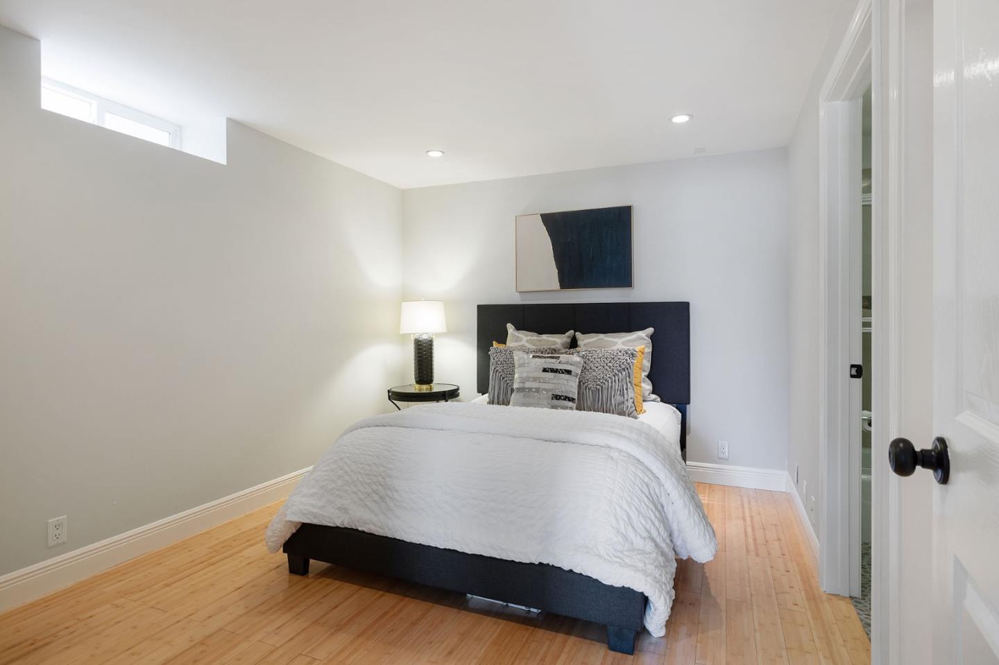 194 Willow Avenue Millbrae, CA 94030 - Photo 43 of 76 a bedroom with a bed and a night stand