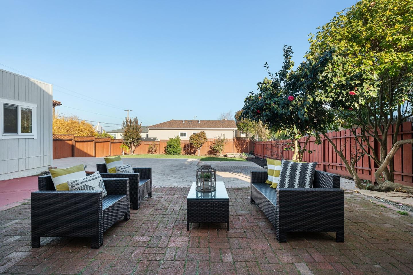 194 Willow Avenue Millbrae, CA 94030 - Photo 47 of 76 a living room with furniture and a flat screen tv