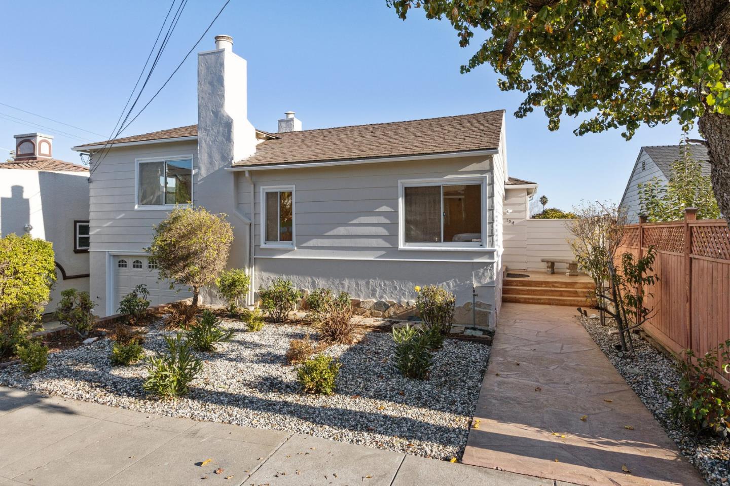 194 Willow Avenue Millbrae, CA 94030 - Photo 62 of 76 a front view of a house with garden
