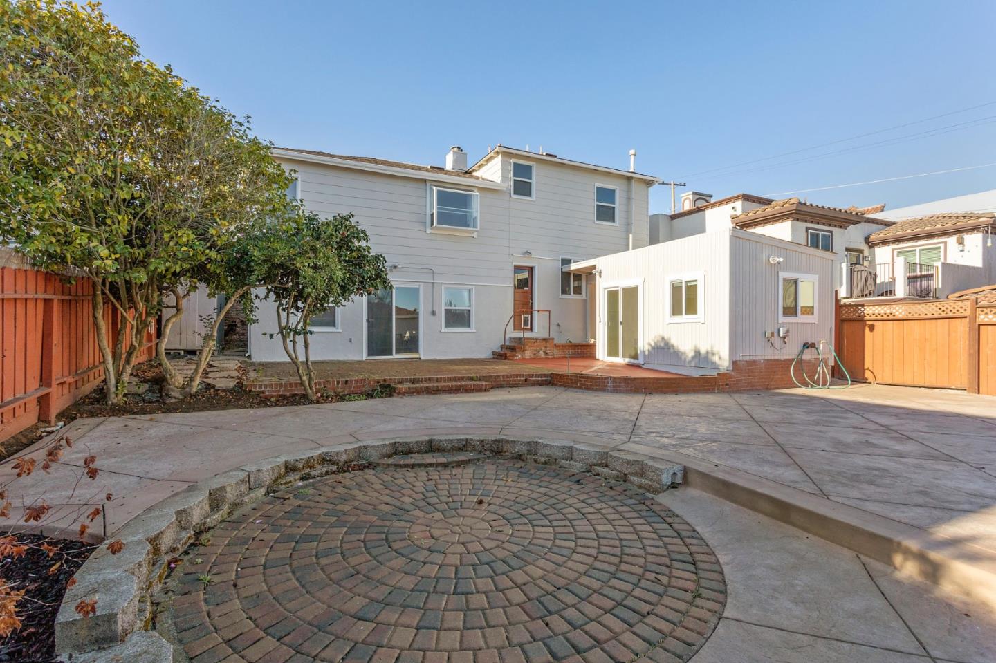 194 Willow Avenue Millbrae, CA 94030 - Photo 70 of 76 a front view of a house with a yard