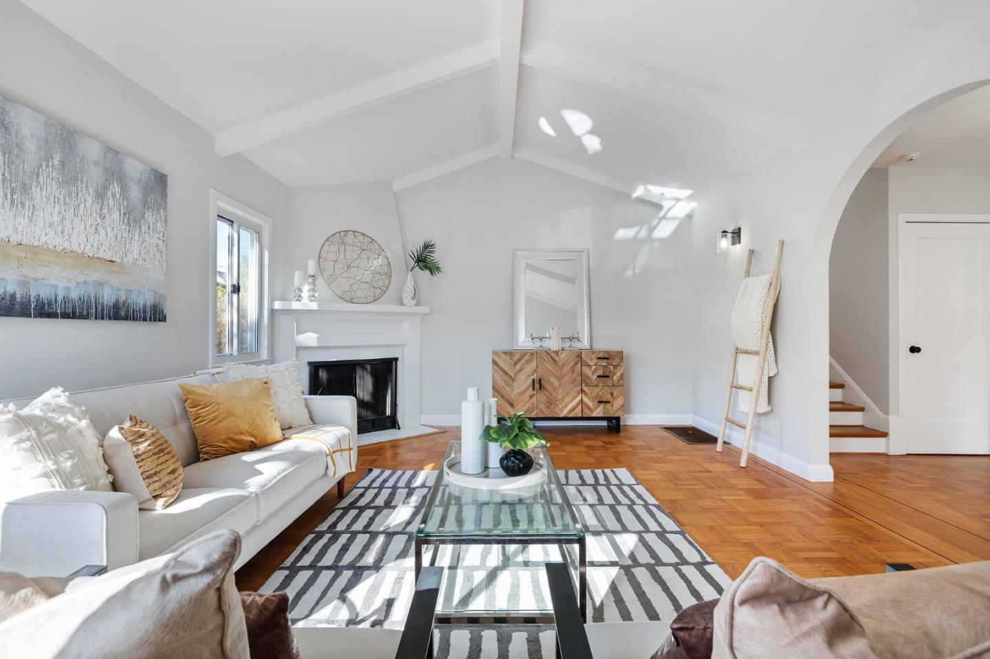 194 Willow Avenue Millbrae, CA 94030 - Photo 9 of 76 a living room with furniture and a fireplace