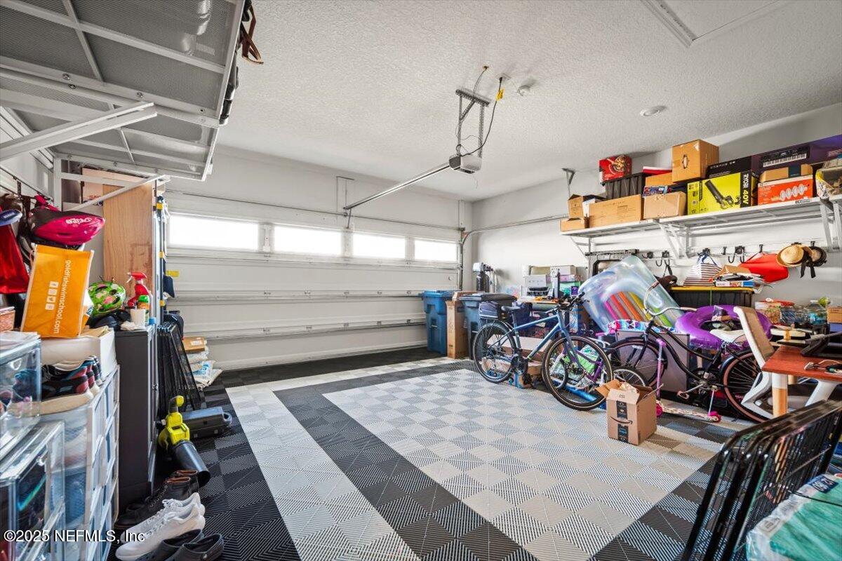 141 Killarney Avenue St. Johns, FL 32259 - Photo 20 of 33 a view of a garage with storage