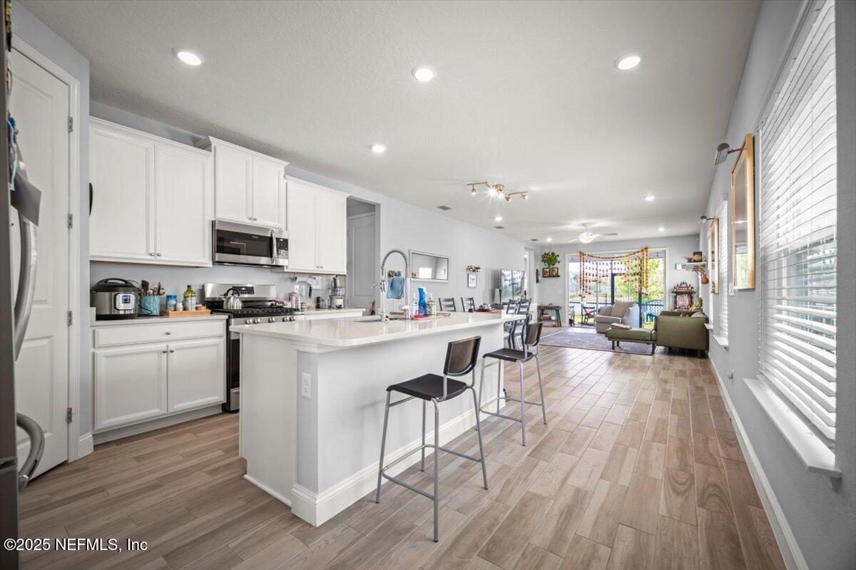 141 Killarney Avenue St. Johns, FL 32259 - Photo 2 of 33 a kitchen with counter space cabinets and appliances