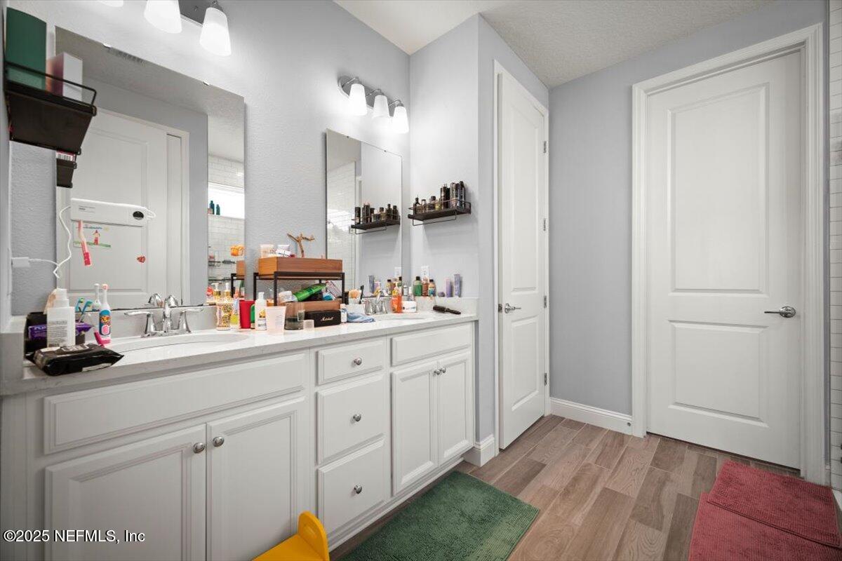 141 Killarney Avenue St. Johns, FL 32259 - Photo 21 of 33 a kitchen with cabinets and window