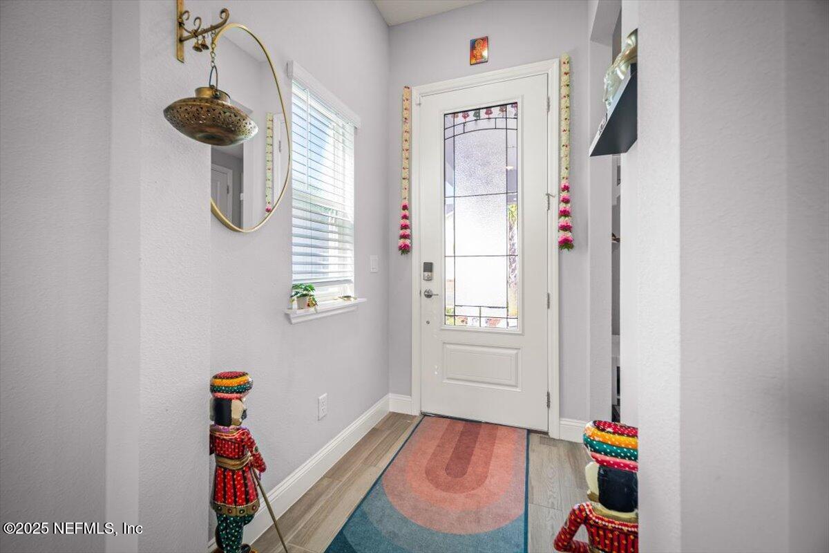 141 Killarney Avenue St. Johns, FL 32259 - Photo 25 of 33 a room with window and hardwood floor