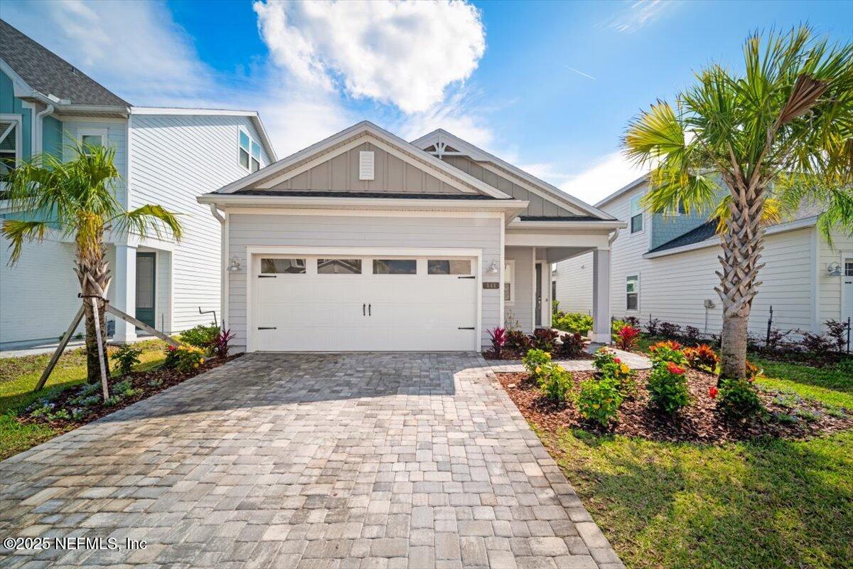 141 Killarney Avenue St. Johns, FL 32259 - Photo 27 of 33 a front view of a house with garden