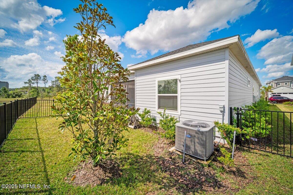 141 Killarney Avenue St. Johns, FL 32259 - Photo 30 of 33 a view of a house with a backyard