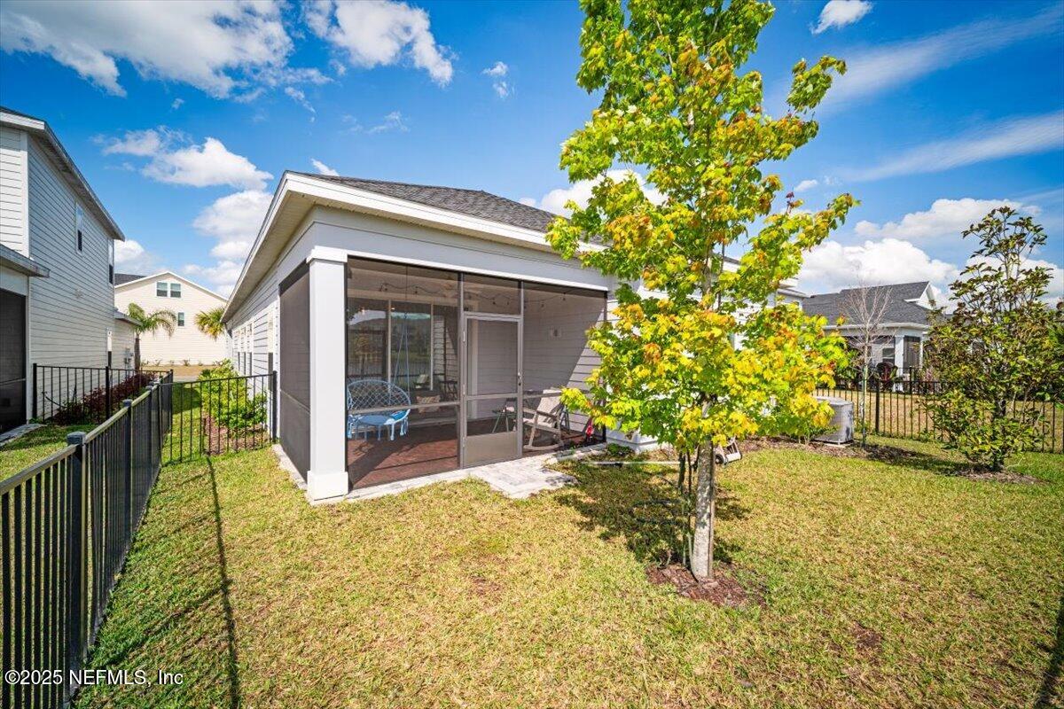 141 Killarney Avenue St. Johns, FL 32259 - Photo 31 of 33 a view of a house with wooden fence
