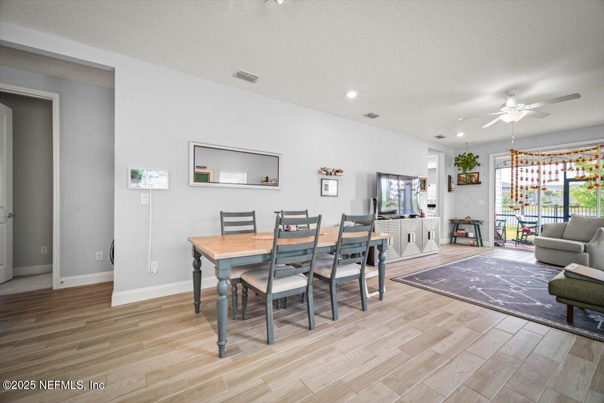 141 Killarney Avenue St. Johns, FL 32259 - Photo 6 of 33 a view of a livingroom with furniture and wooden floor